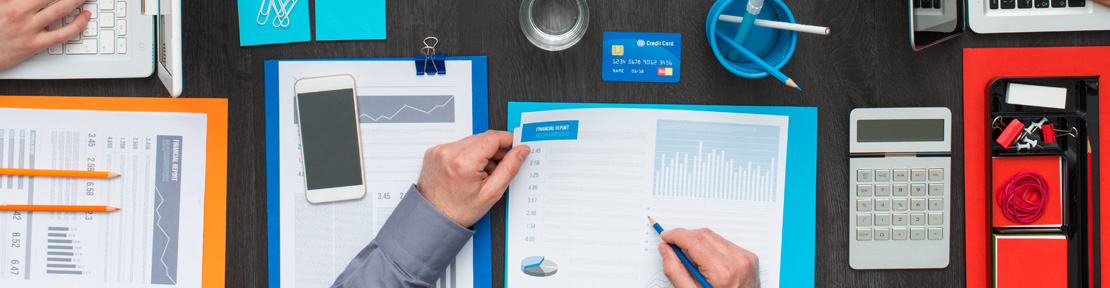 Insurance papers spread out on table